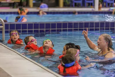 Instructor with students in PFD's