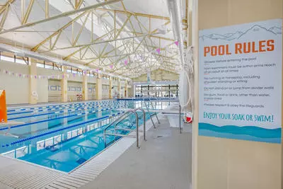 Lap pool with pool rules sign