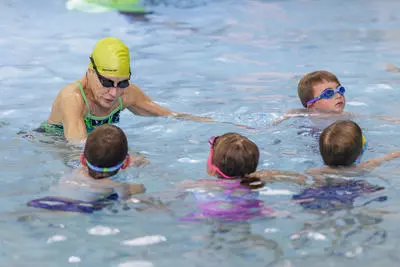 Swim Instructor teaching swim lessons