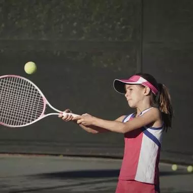 Girl Playing Tennis